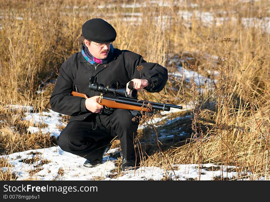 Winter hunter. Vivid sunny day