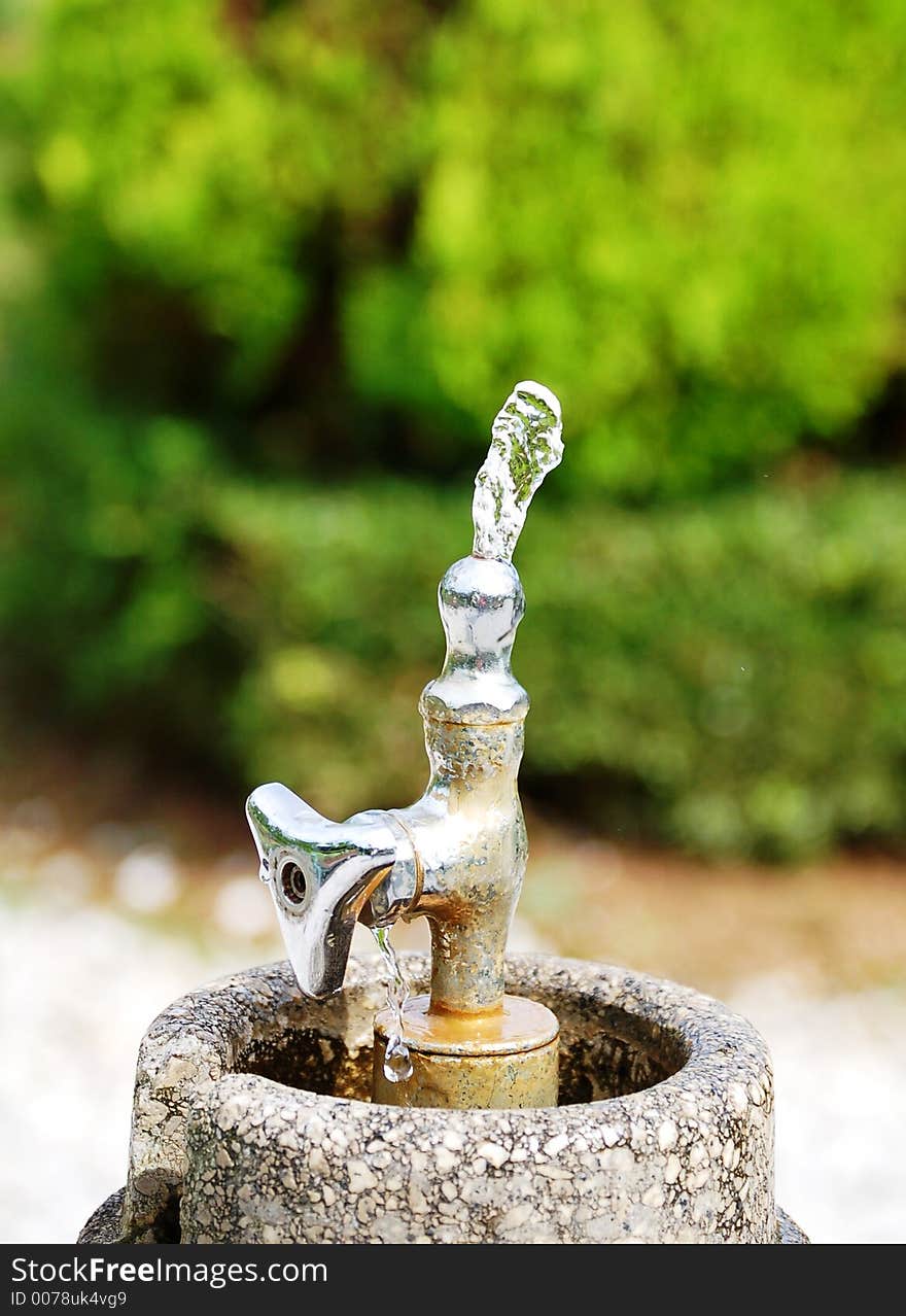 A classic Japanese tap water in the garden. A classic Japanese tap water in the garden.