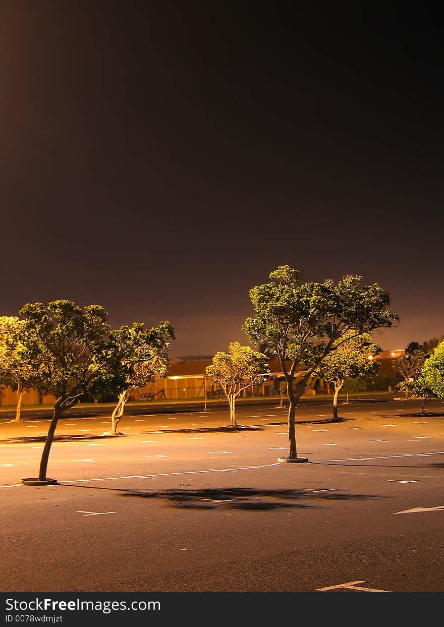 Portrait photo of a parking lot at night. Portrait photo of a parking lot at night.