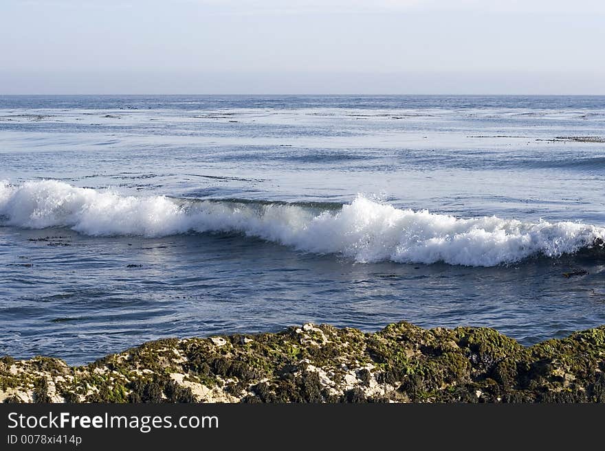 Image of an ocean wave breaking. Image of an ocean wave breaking.