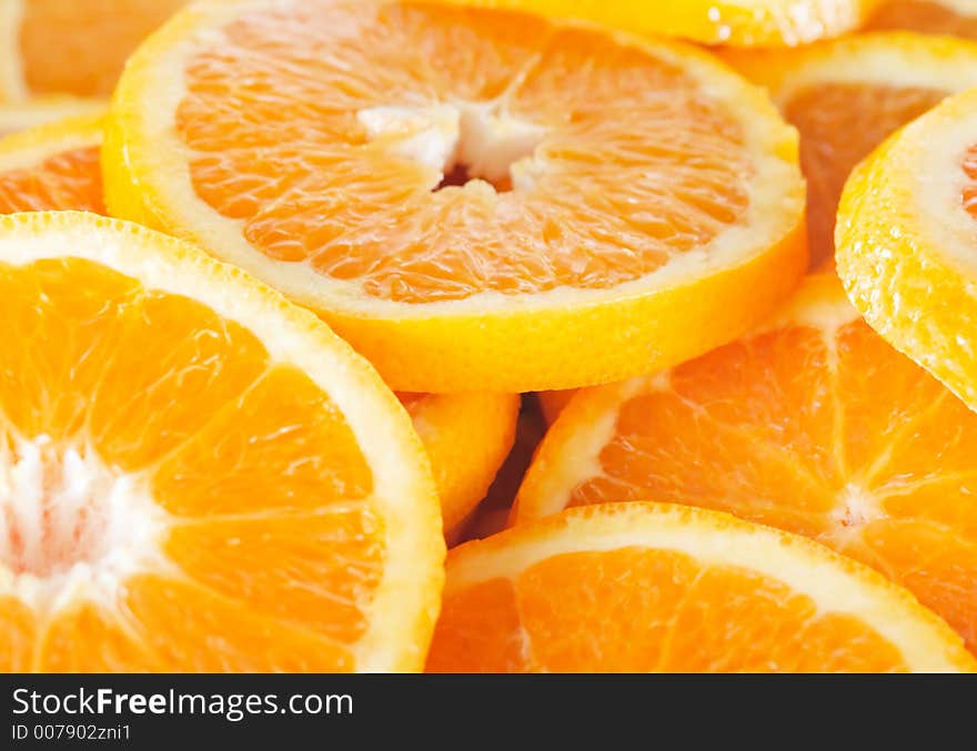 A background of orange slices. A background of orange slices