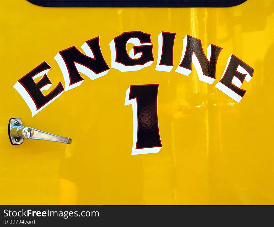 The yellow door on a fire engine truck. The yellow door on a fire engine truck.