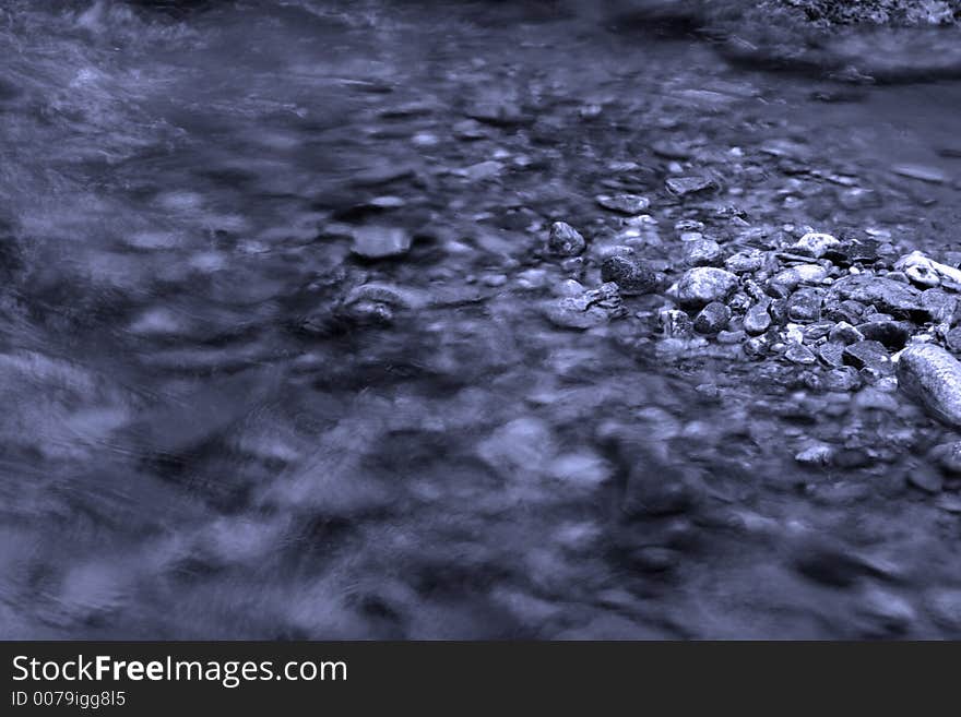 Blue water and rock texture. Blue water and rock texture