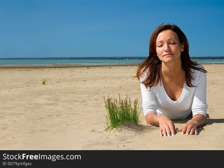 Girl laying on a beach-5