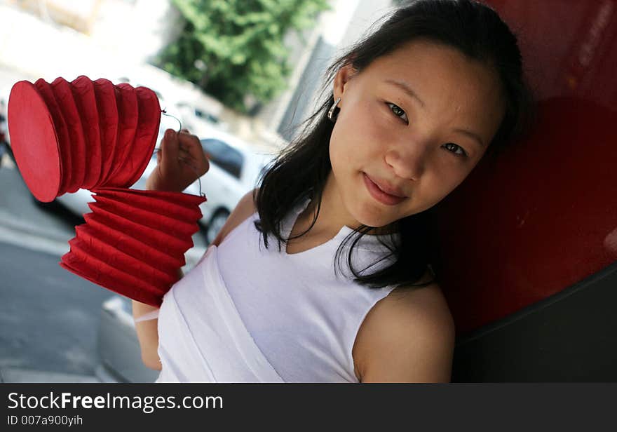 Pretty Korean woman with red lanterns