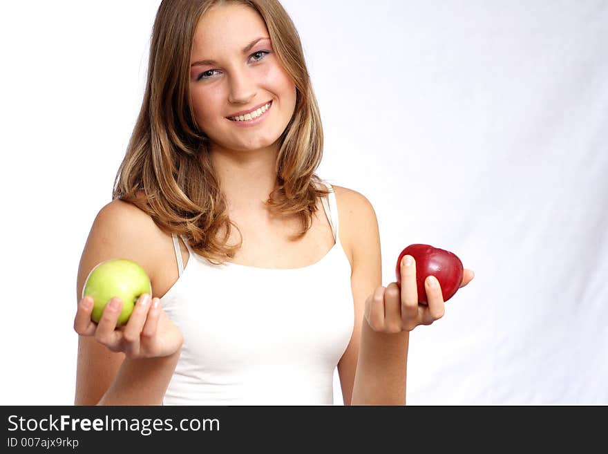 Woman holding green and red apple. Woman holding green and red apple.