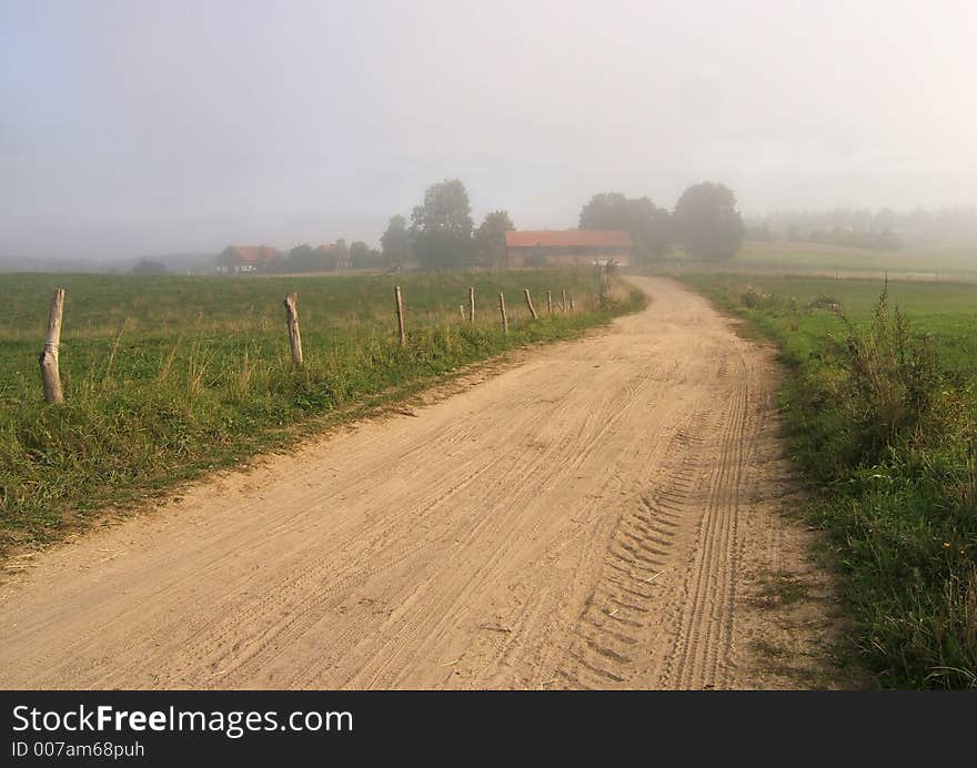 Autumn, foggy road to farm. Autumn, foggy road to farm