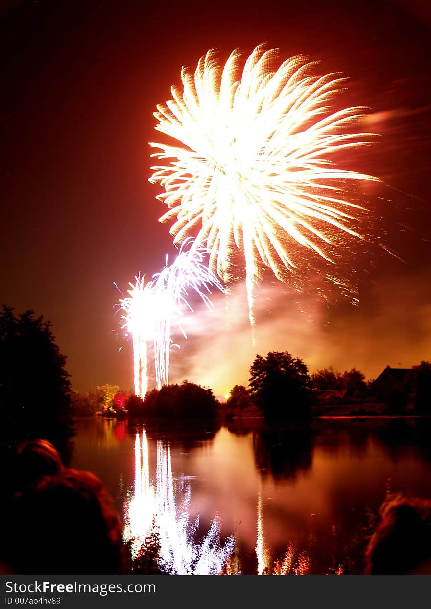 Fireworks and reflection on water