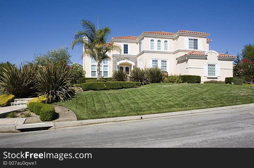 Exterior shot of a large luxurious home.