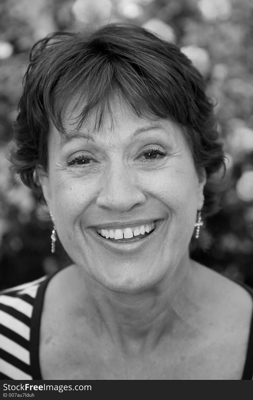 Closeup of a senior citizen smiling in black and white. Closeup of a senior citizen smiling in black and white