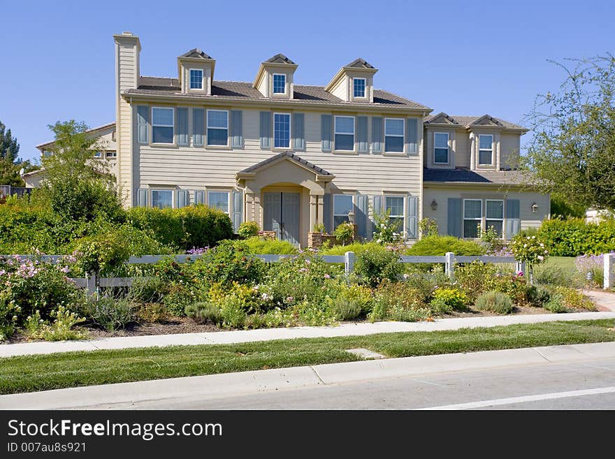 Exterior shot of a large luxurious home.