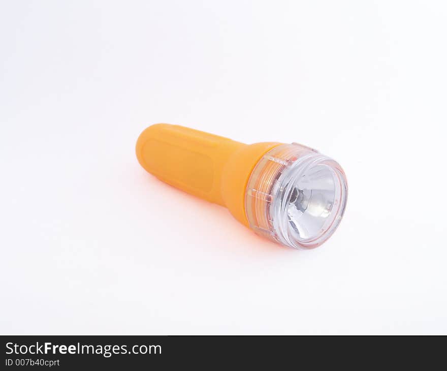 Yellow, waterproof flashlight for travellers