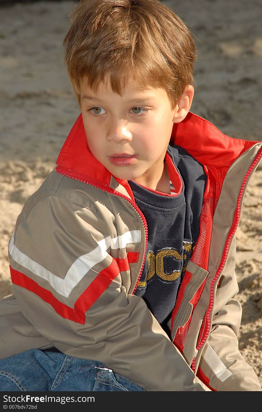 Young child portrait photographed outdoors. Young child portrait photographed outdoors