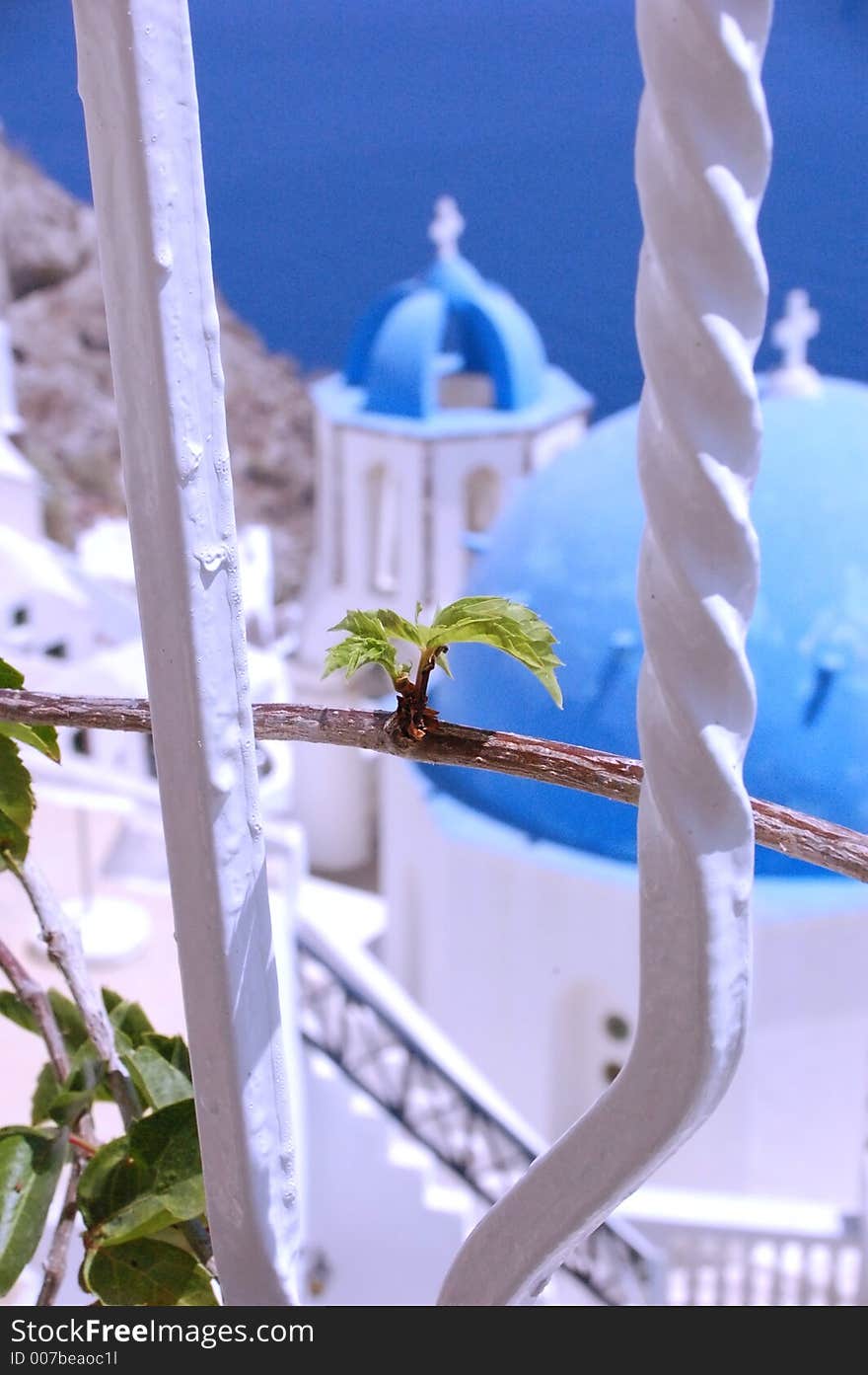 a detail of a fence in front of a church. a detail of a fence in front of a church