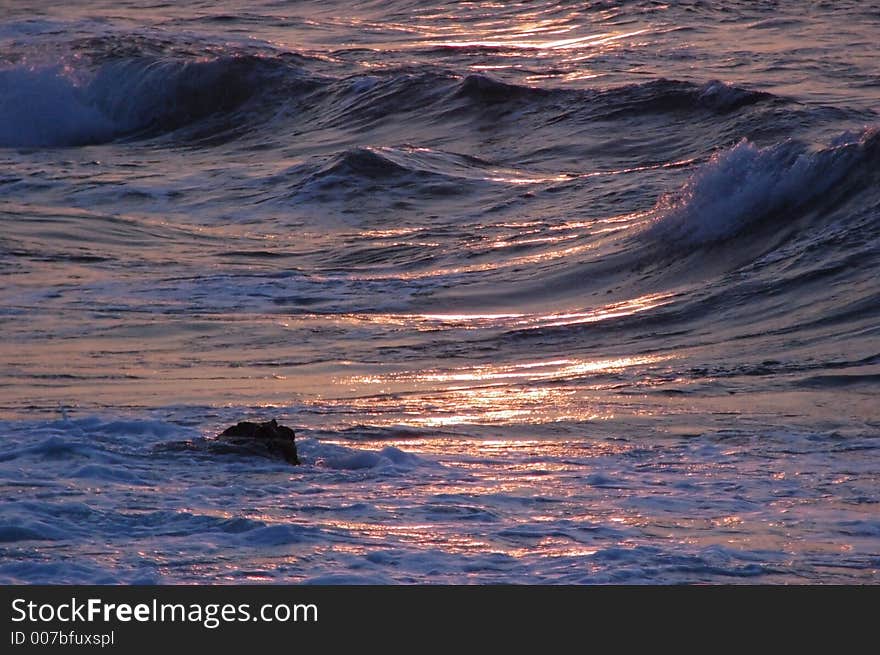 sunrays reflecting on the waves. sunrays reflecting on the waves