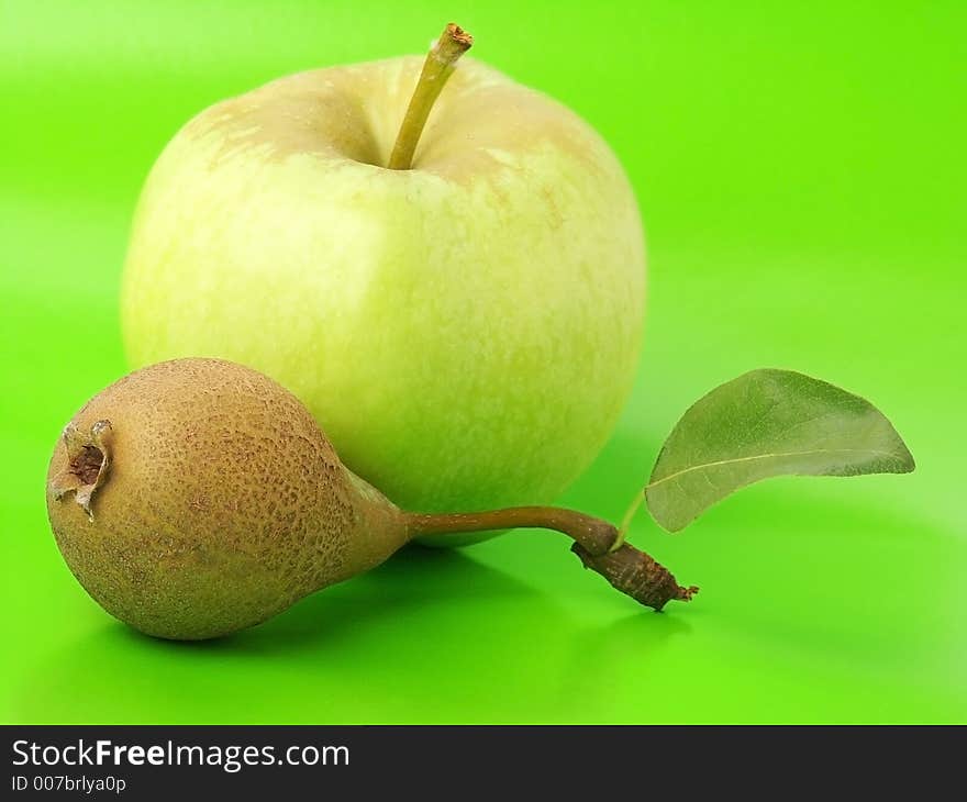 Apple & Pear with Fluorescent Green Background.