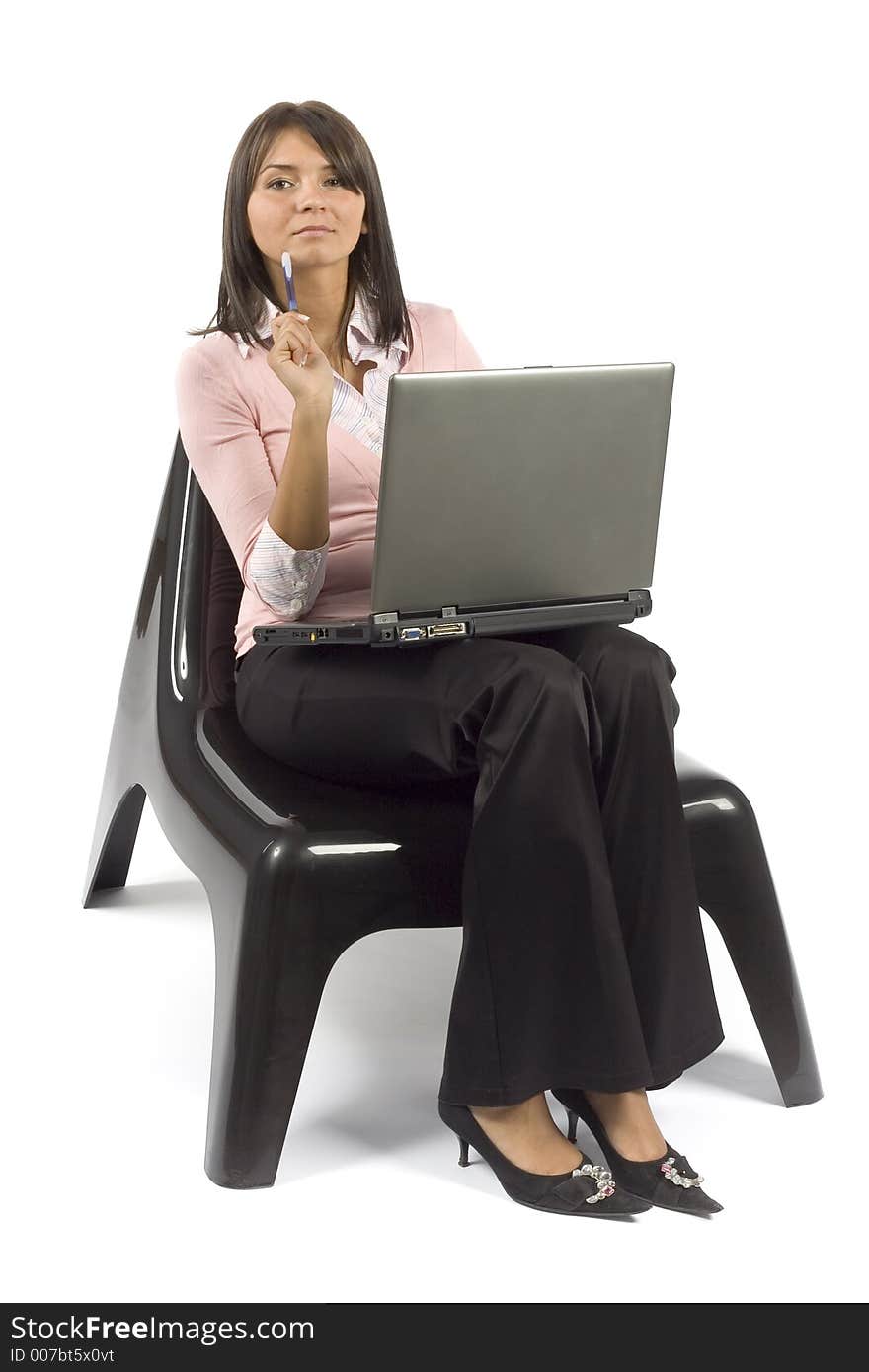 Isolated woman sitting; working computer