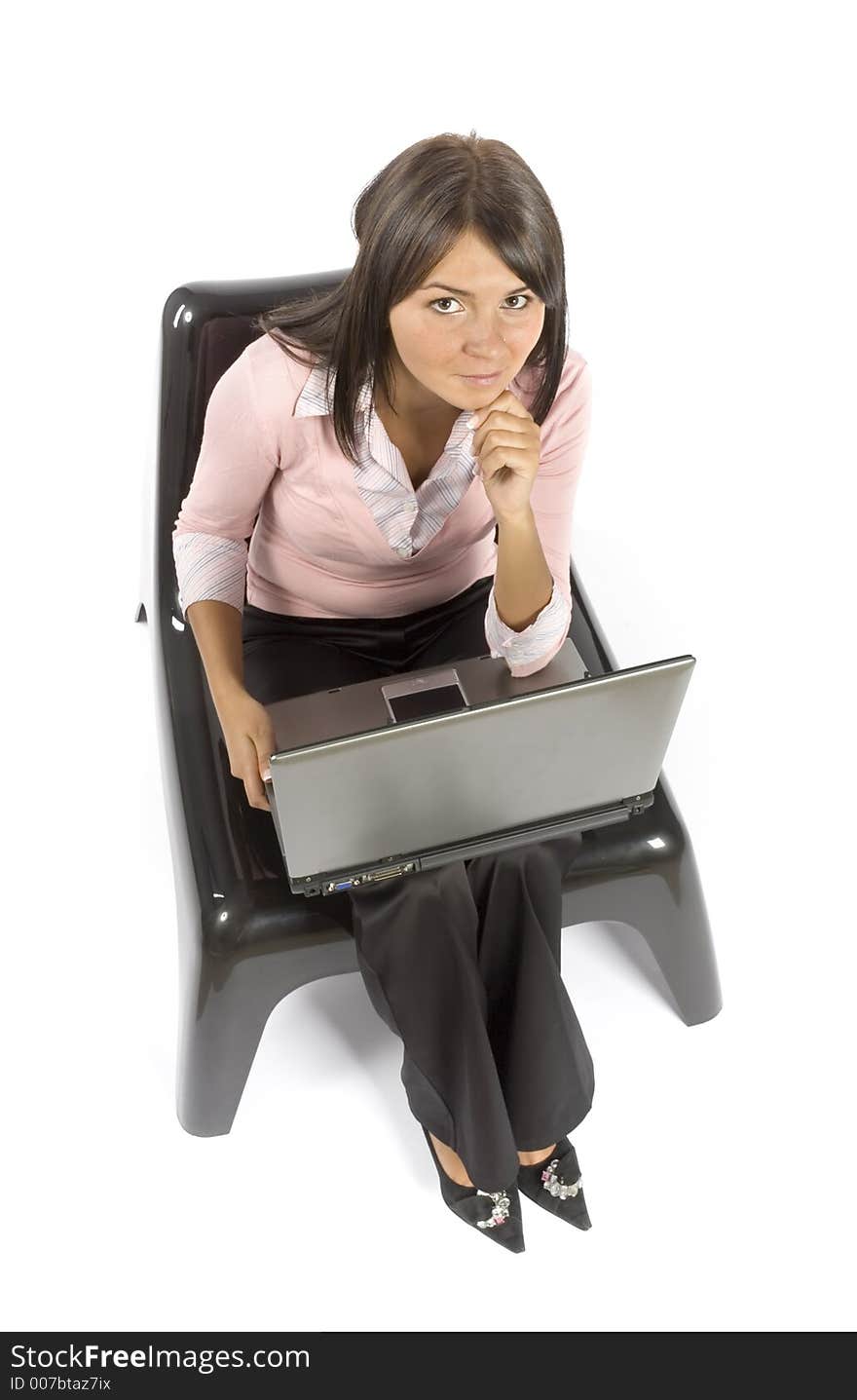 Isolated woman sitting; working computer