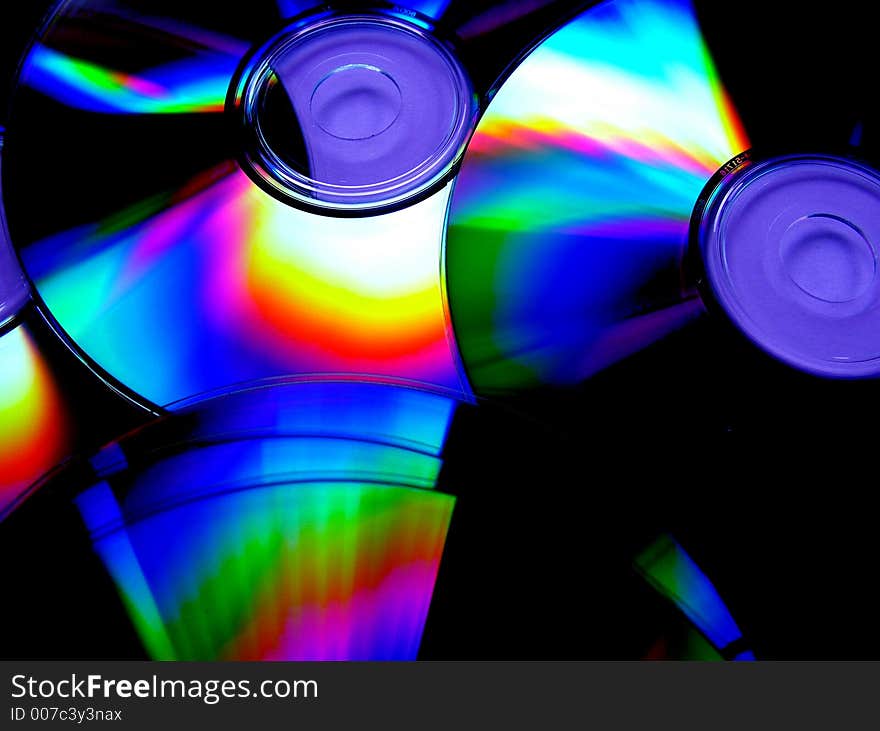 Photo of cds with light refecting off of them. Photo of cds with light refecting off of them