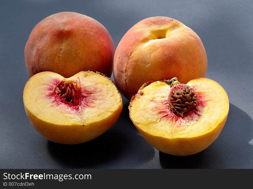 Ripe juicy fleshy peaches