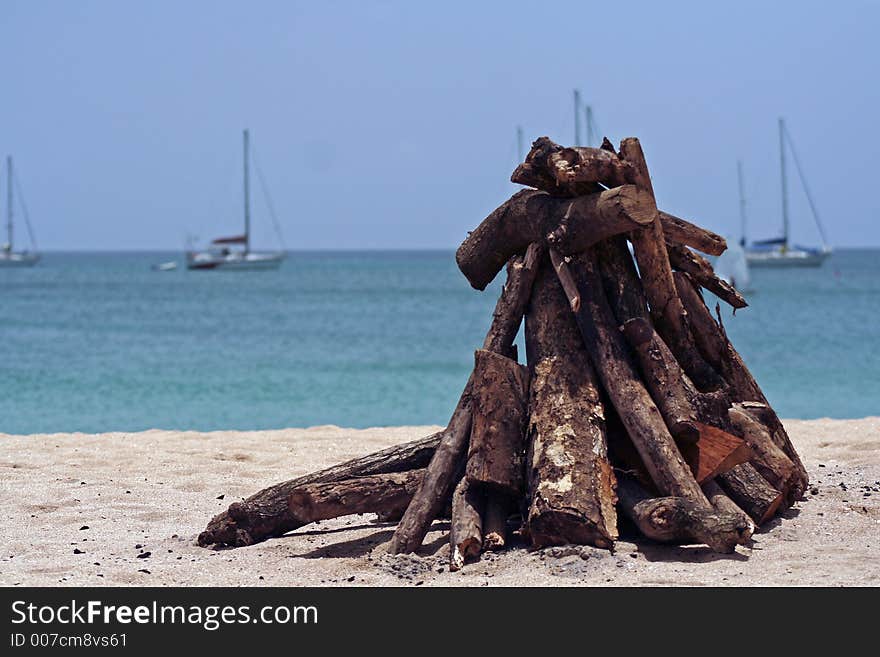 A wood pyre on the beach at Rodney Bay, St. Lucia. A wood pyre on the beach at Rodney Bay, St. Lucia