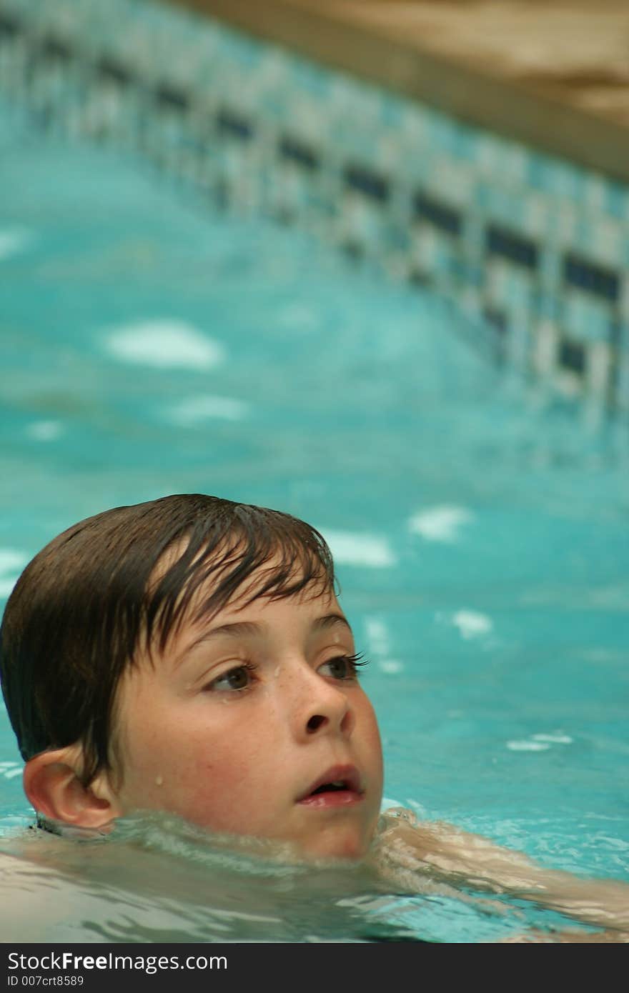 Child having fun swimming in pool. Child having fun swimming in pool