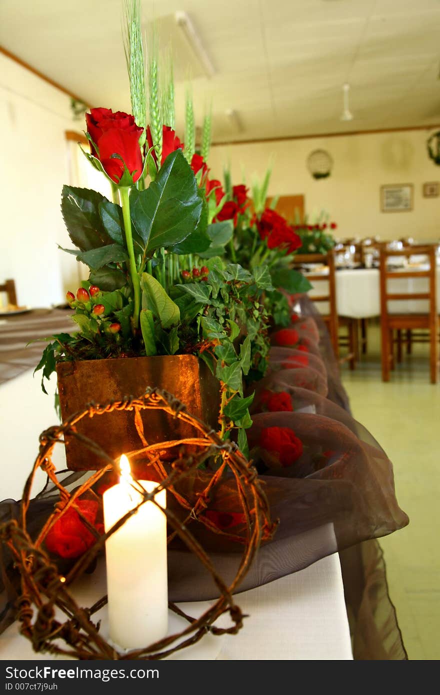 Table arraignment of red roses