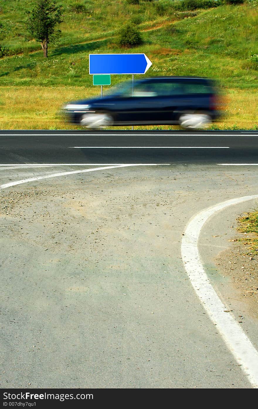 A car speeding on the motorway - car is blurry, suggesting speed. Road signs are blank, you can add your own info.