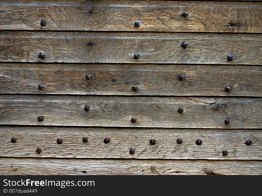 Studded ancient door detail