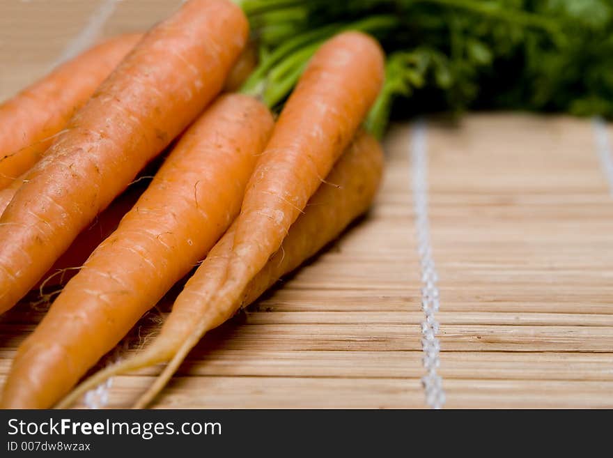 Fresh carrots with stems attached