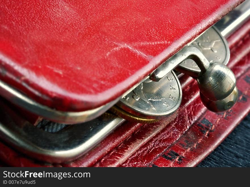 Shabby purse with last coins. Shabby purse with last coins