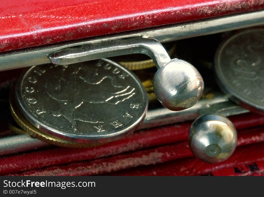 Shabby purse with last coins. Shabby purse with last coins