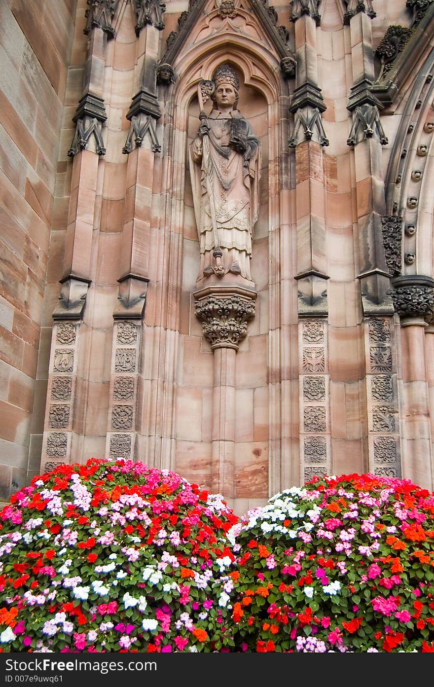 Stone carving and flowers