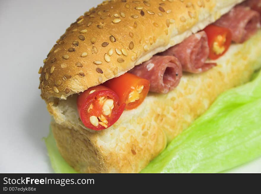 Ham chili and lettuce sandwich