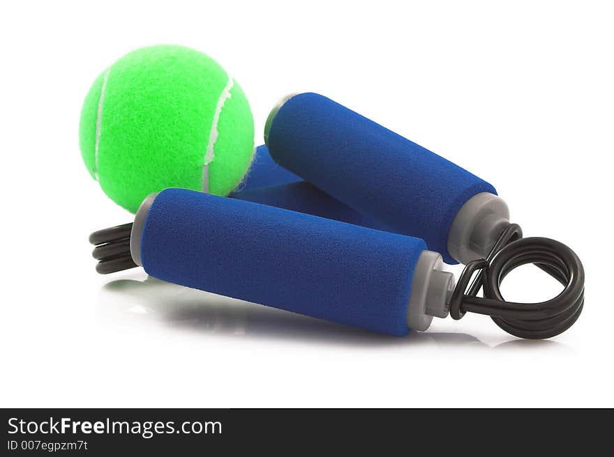 Handgrip strenghtening sports gear with tennis ball. Handgrip strenghtening sports gear with tennis ball