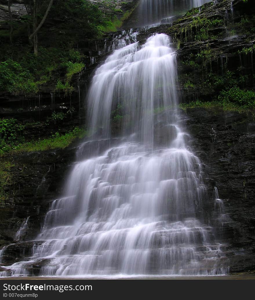 July 2006 - Early morning photograph of this stunning waterfall in south/central West Virgina. This gem of a waterfall, nearly 100 feet high, feeds into the New River, one of the oldest rivers in the world. July 2006 - Early morning photograph of this stunning waterfall in south/central West Virgina. This gem of a waterfall, nearly 100 feet high, feeds into the New River, one of the oldest rivers in the world.