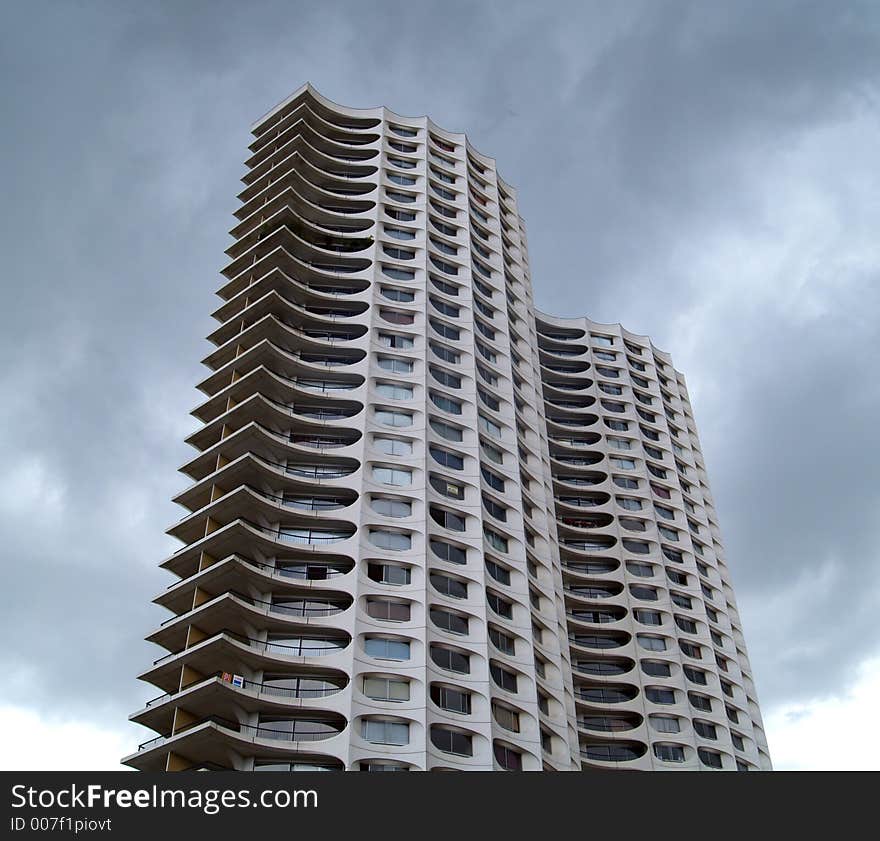 A white residential tower building