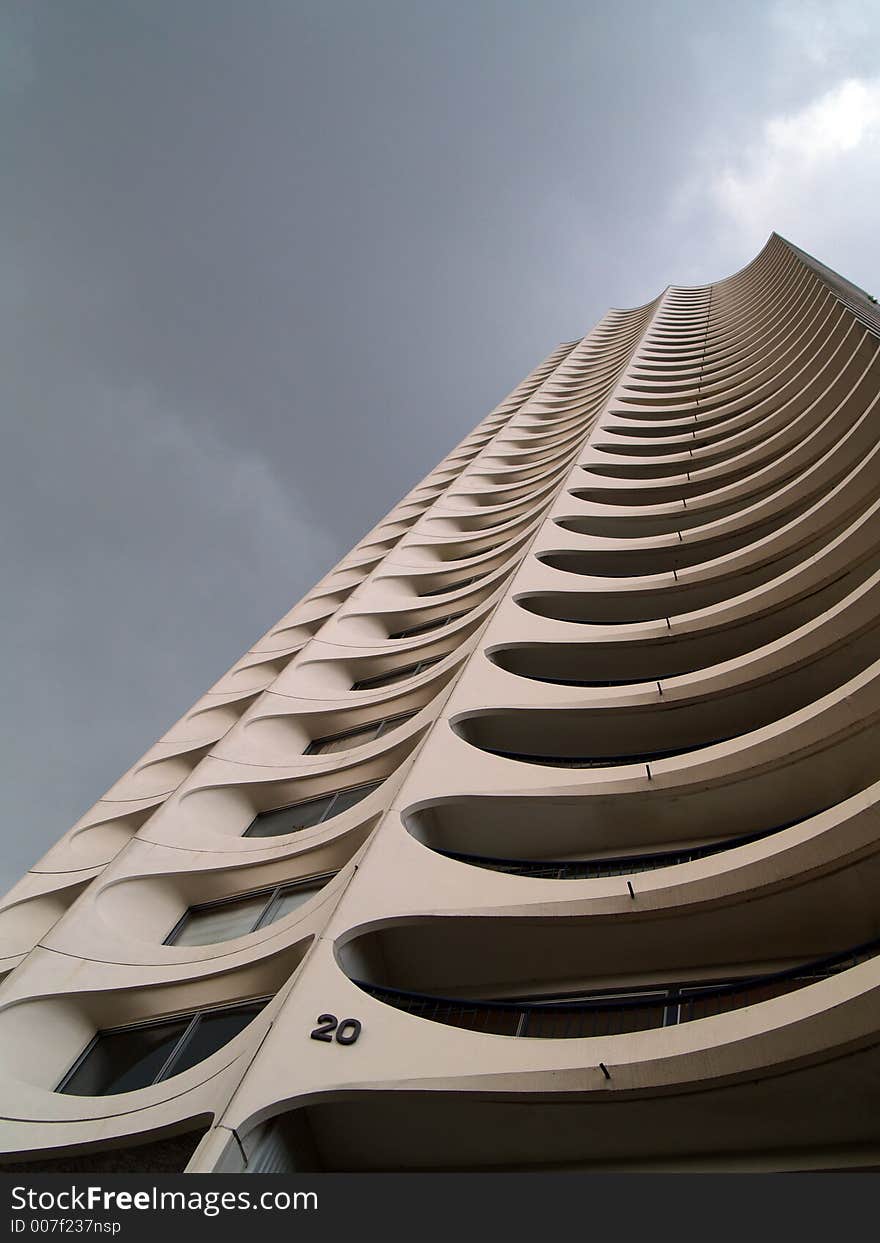 A white residential tower building