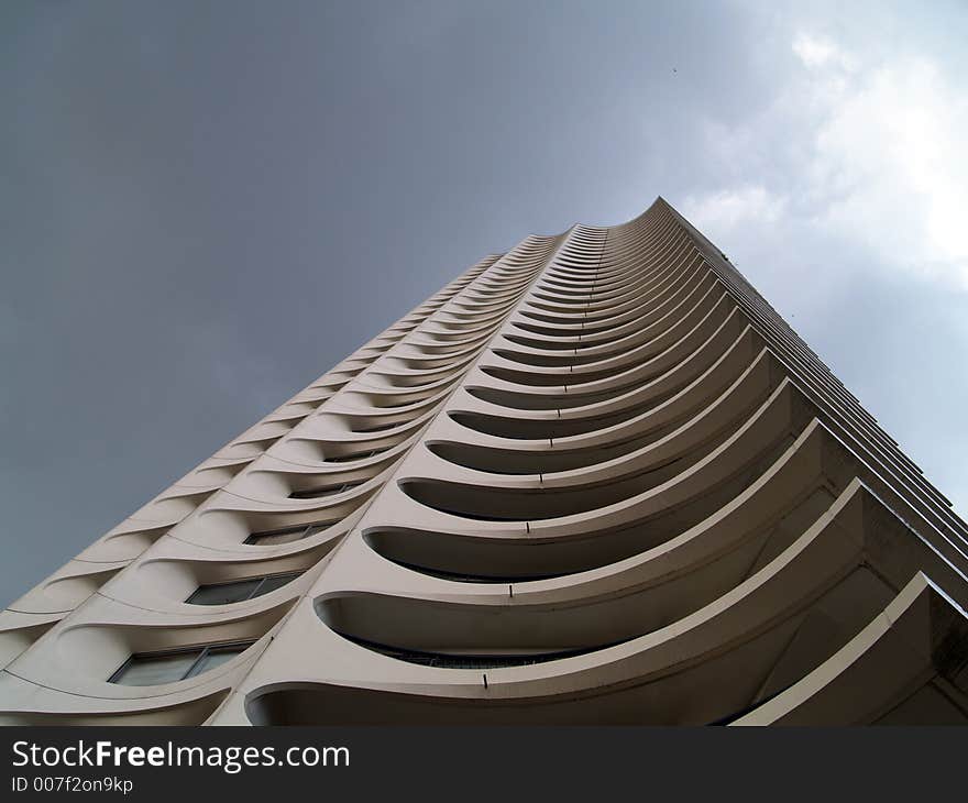 A white residential tower building