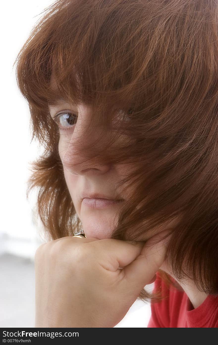 Unusual portrait of female hair partially covering face. Unusual portrait of female hair partially covering face