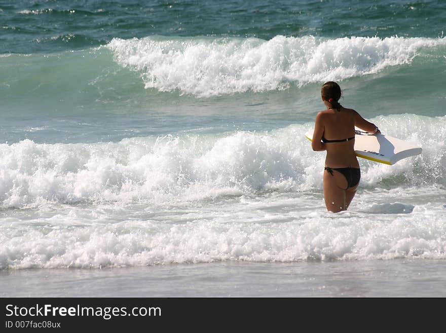 Bikini girl with bodyboard