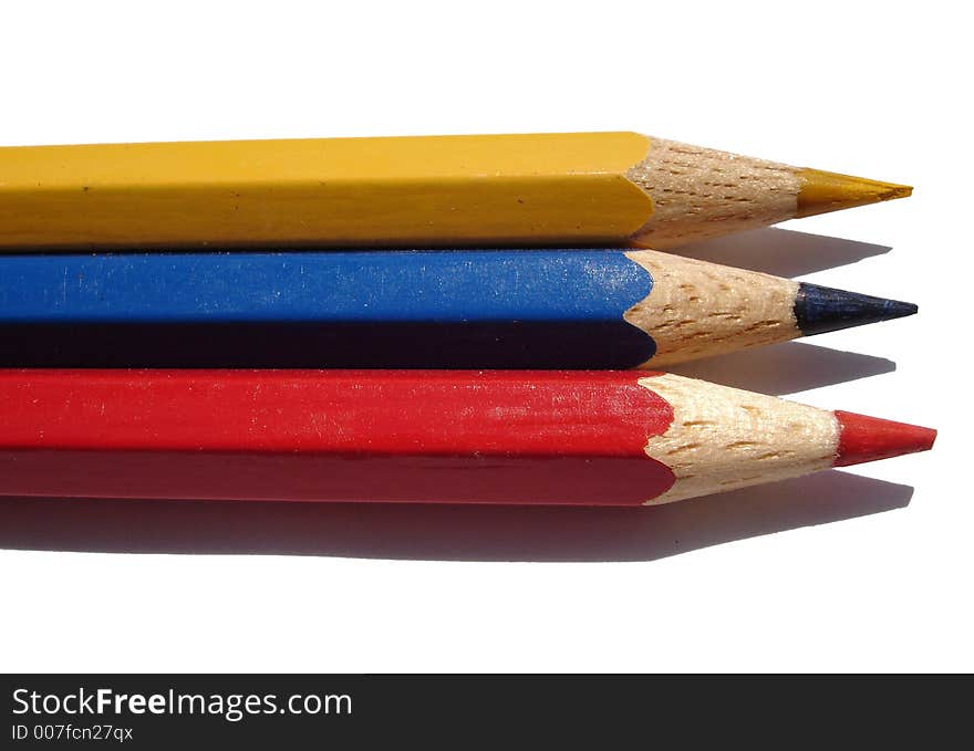 Color wood pencils red blue yellow