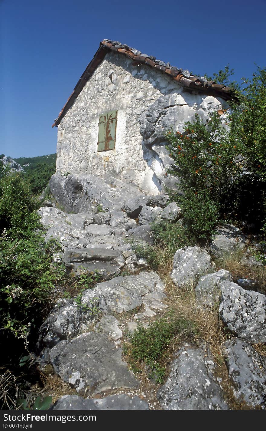 Stone and house