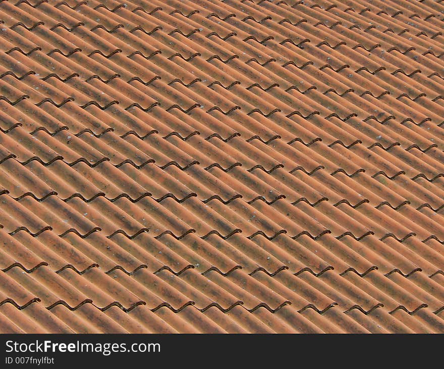 Red brick roof, all coloured stones. Red brick roof, all coloured stones