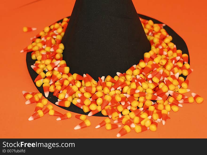 Halloween scene of a witch's hat with candy corn. Halloween scene of a witch's hat with candy corn