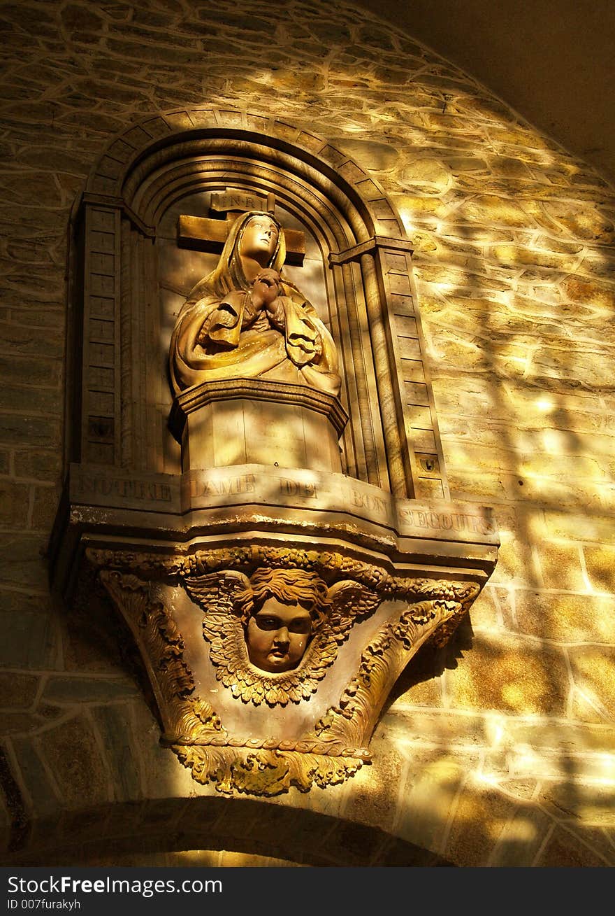 Statue in a church (Mary prying). Statue in a church (Mary prying)