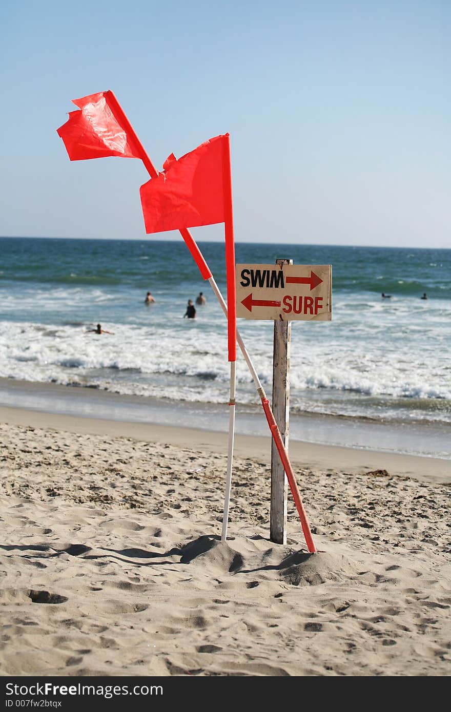 Swim and surf sign on the beach