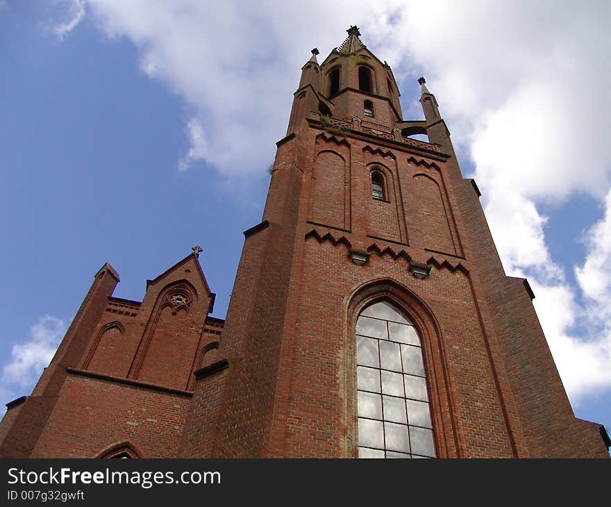 Old brick-red church in small town