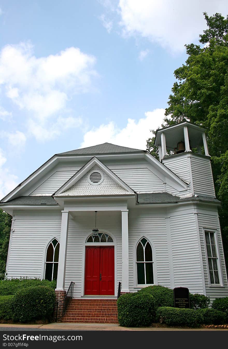 White church with red door