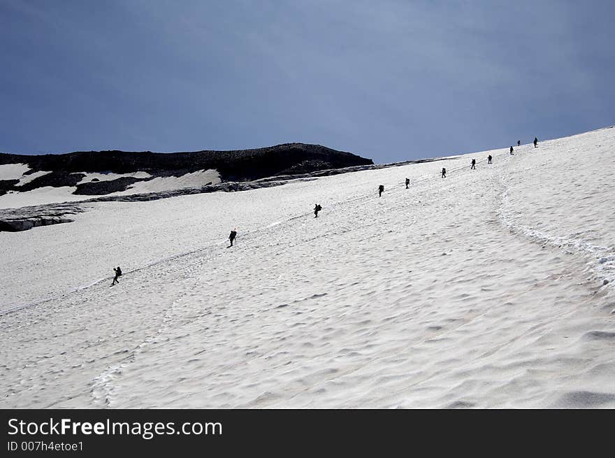 Mountain climbers coming down Mt Rainier